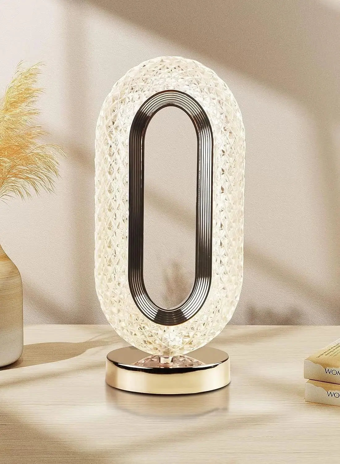 Decorative table lamp with textured design on a neutral background